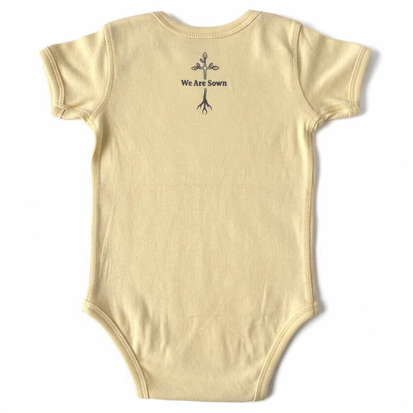 Yellow 18 month old onesie, he is risen